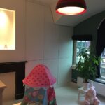 Ontwerp wandkast om schouw in de kinderkamer